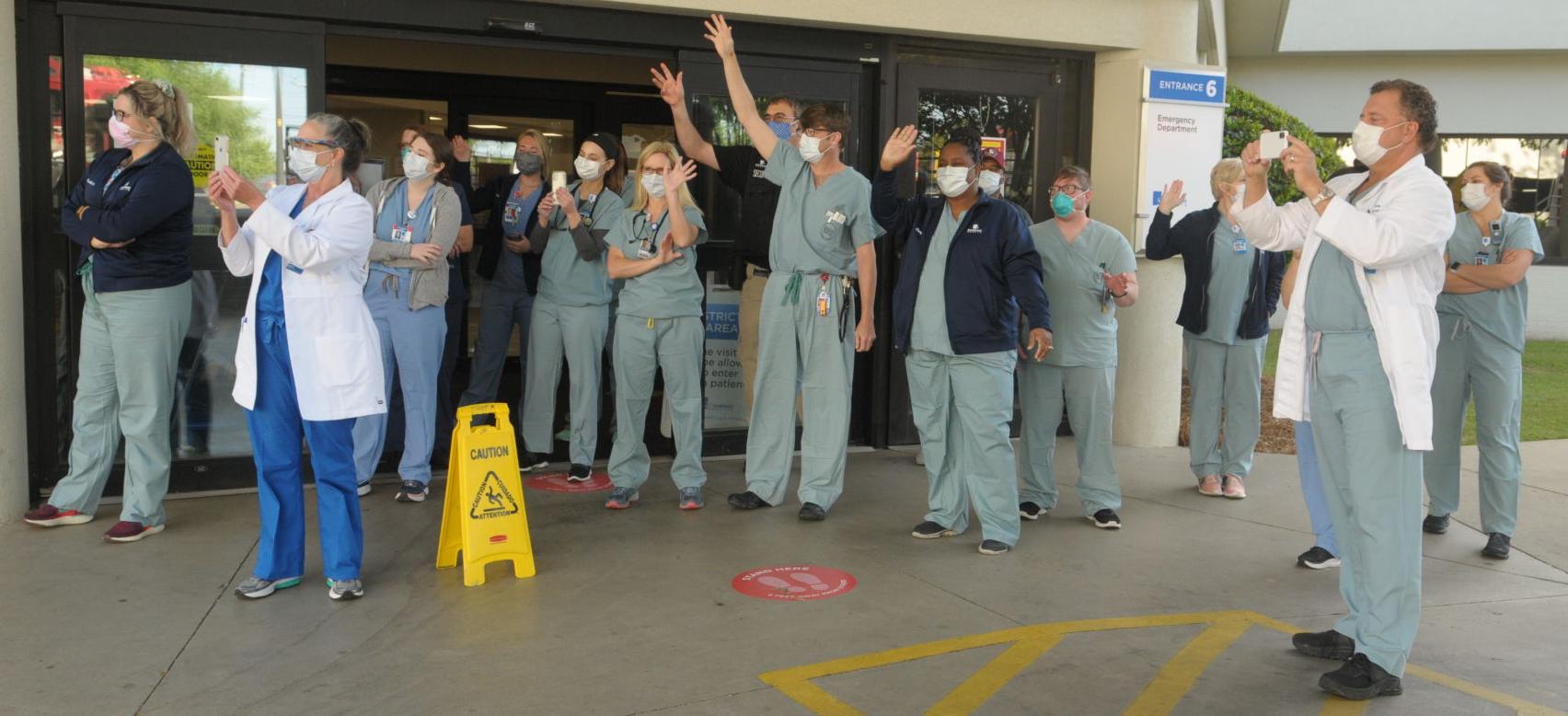 First responders give rolling salute to local health care workers